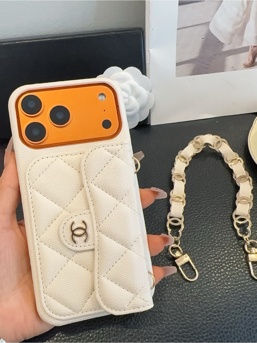 CHANEL Cream Quilted Leather Phone Case with Gold Chain Accent iPhone 17 pro max